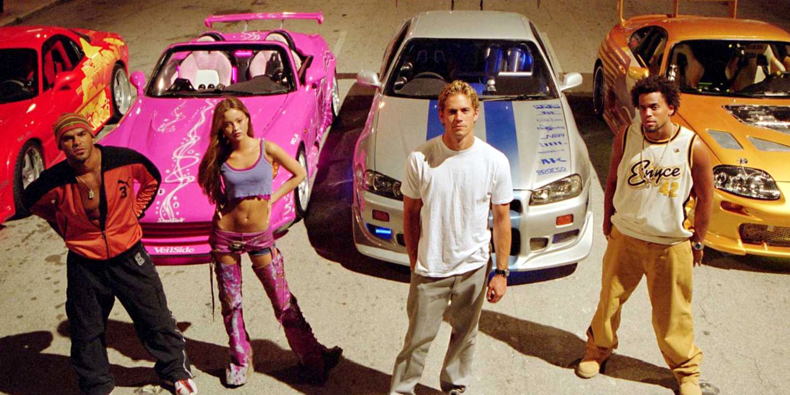 Paul Walker in front of his Nissan Skyline in 2 Fast 2 Furious