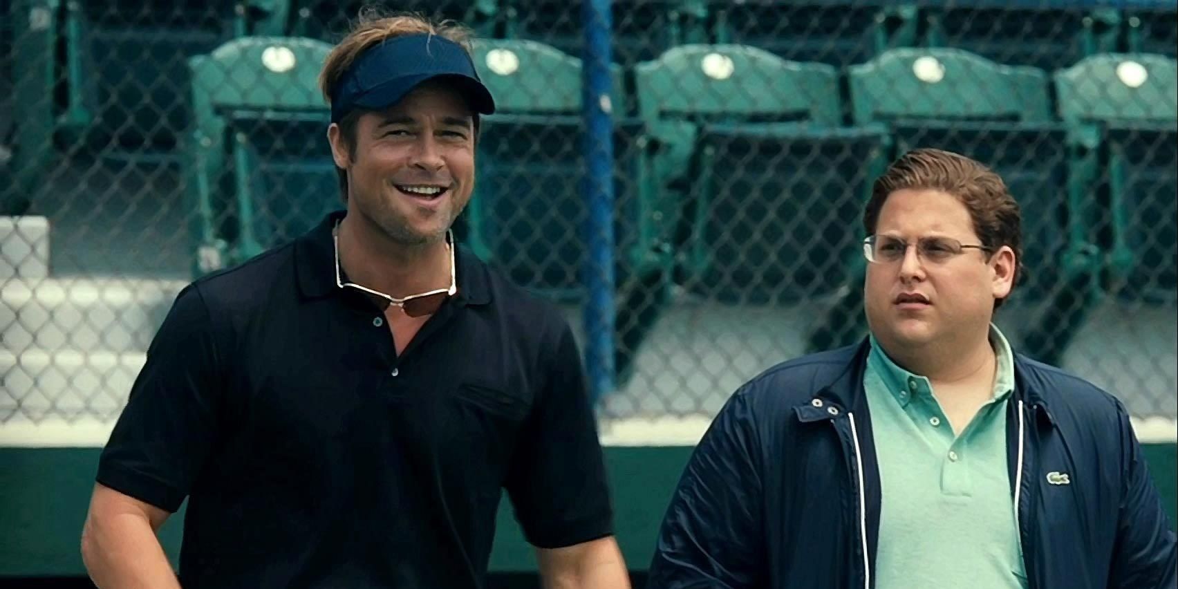 Brad Pitt as Billy Beane scouting his team in Moneyball.