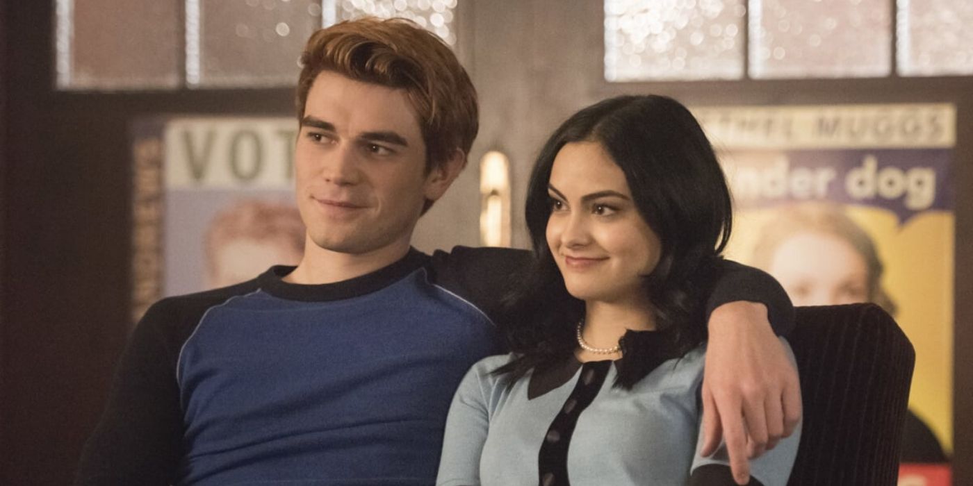 Archie with his arm around Veronica in Riverdale