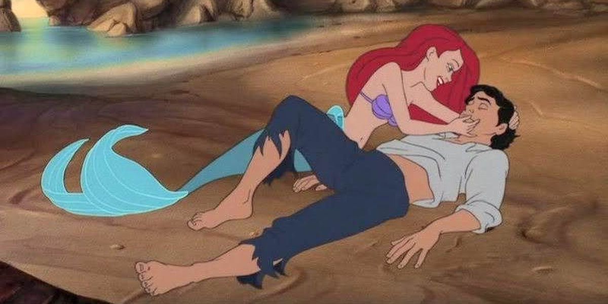 Ariel and Eric on the beach after she saves him from drowning in The Little Mermaid
