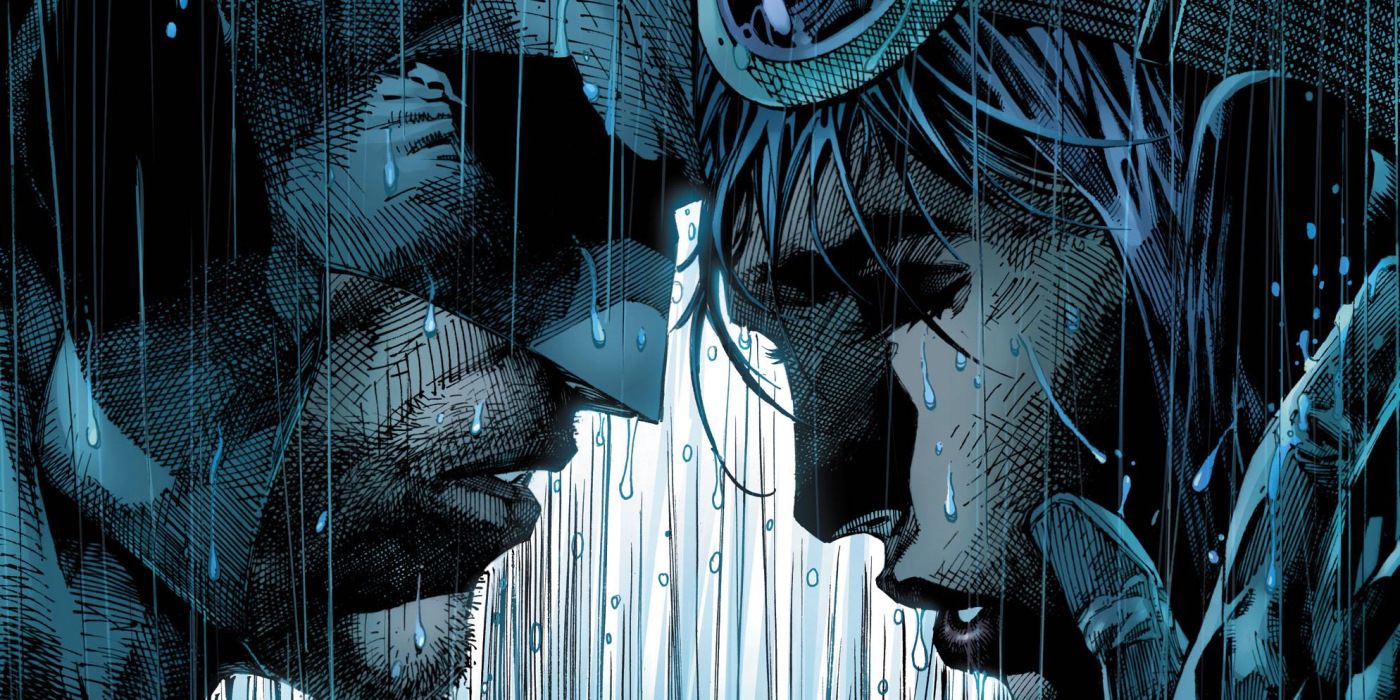Batman and Catwoman facing each other in the Rain