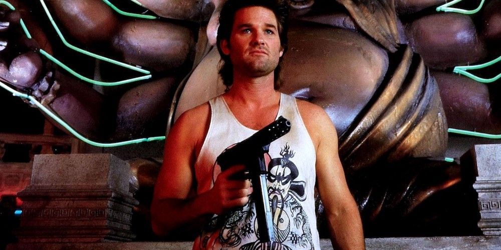 Jack holds a pistol in Big Trouble In Little China