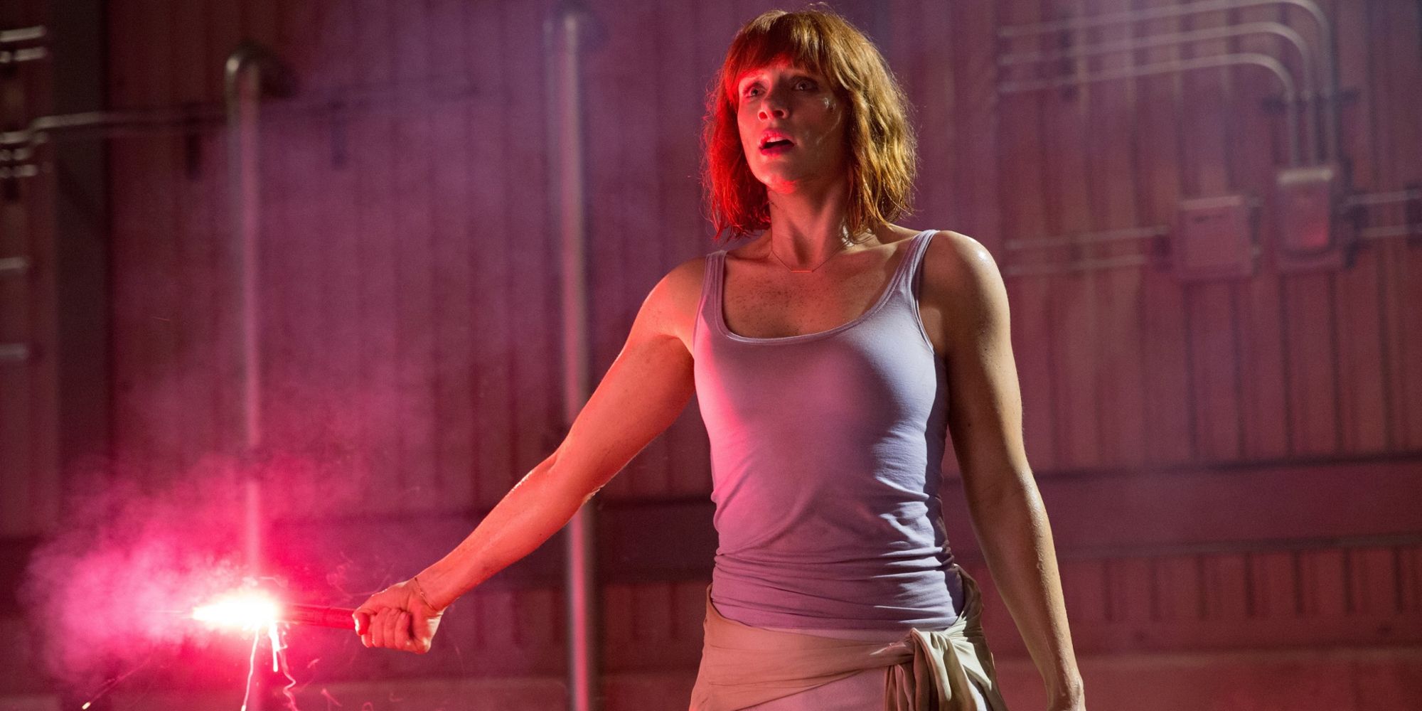 Claire Dearing wielding a flare in Jurassic World