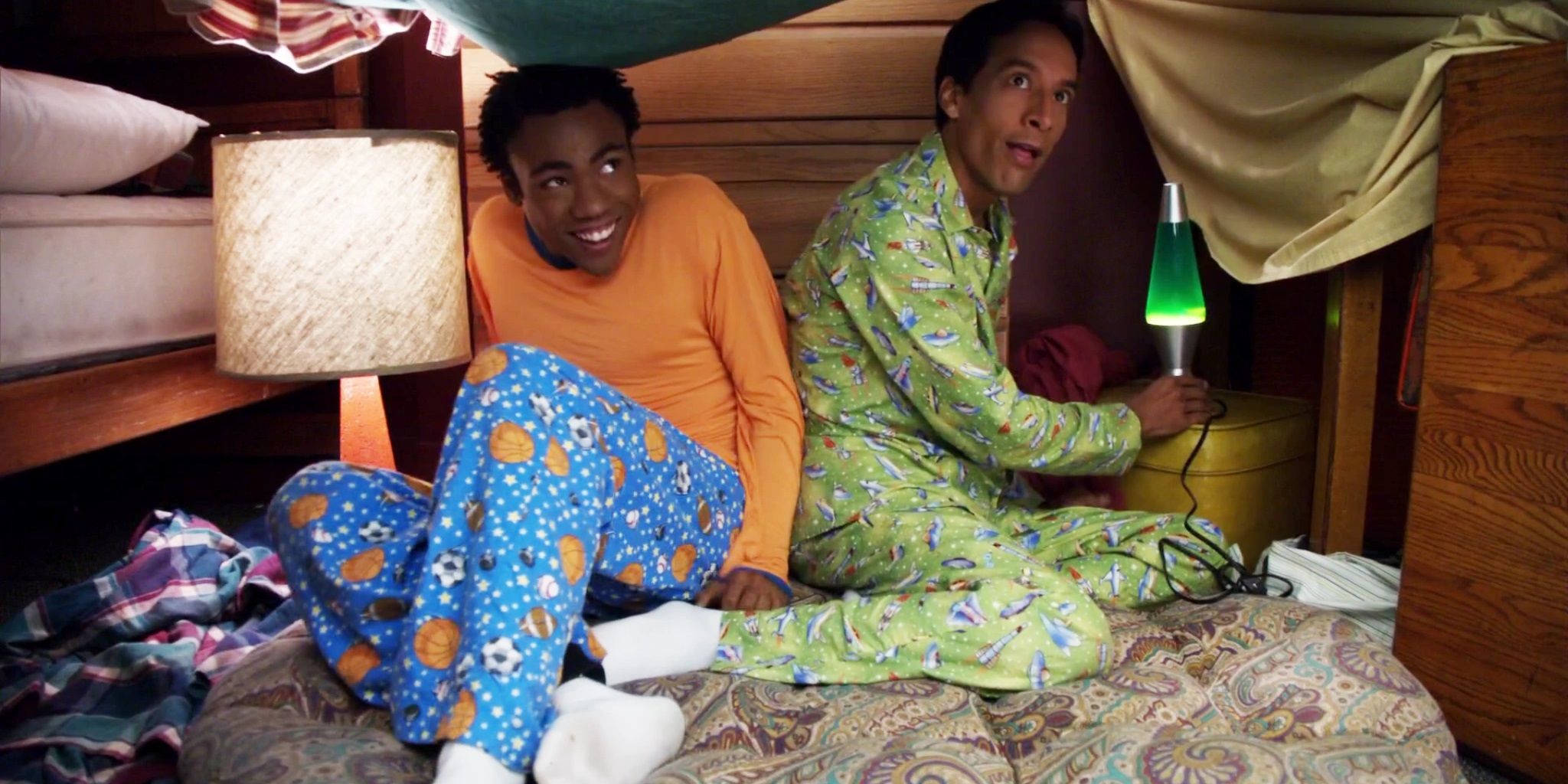 Abed and Troy inside a blanket fort in Community