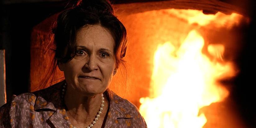 Anita Roycewood (Beth Grant) stands in front of the flames in her crematorium in Criminal Minds
