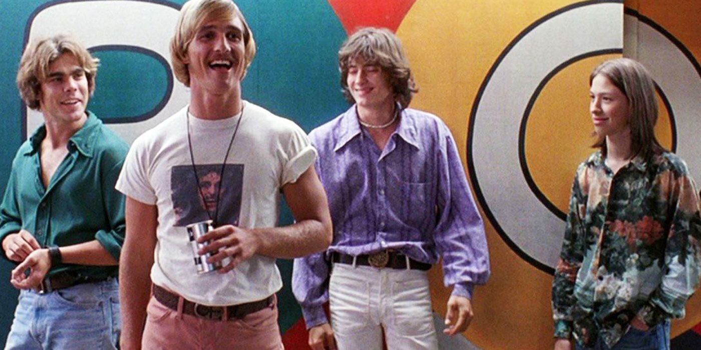 McConaughey and other actors standing against the colorful wall in Dazed and Confused