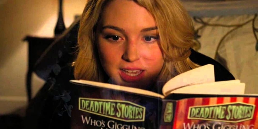 Actor reading a book in Deadtime Stories