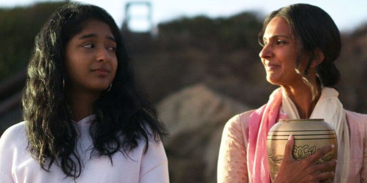 Devi and Nalini with the urn of Mohan's ashes on the beach in Never Have I Ever