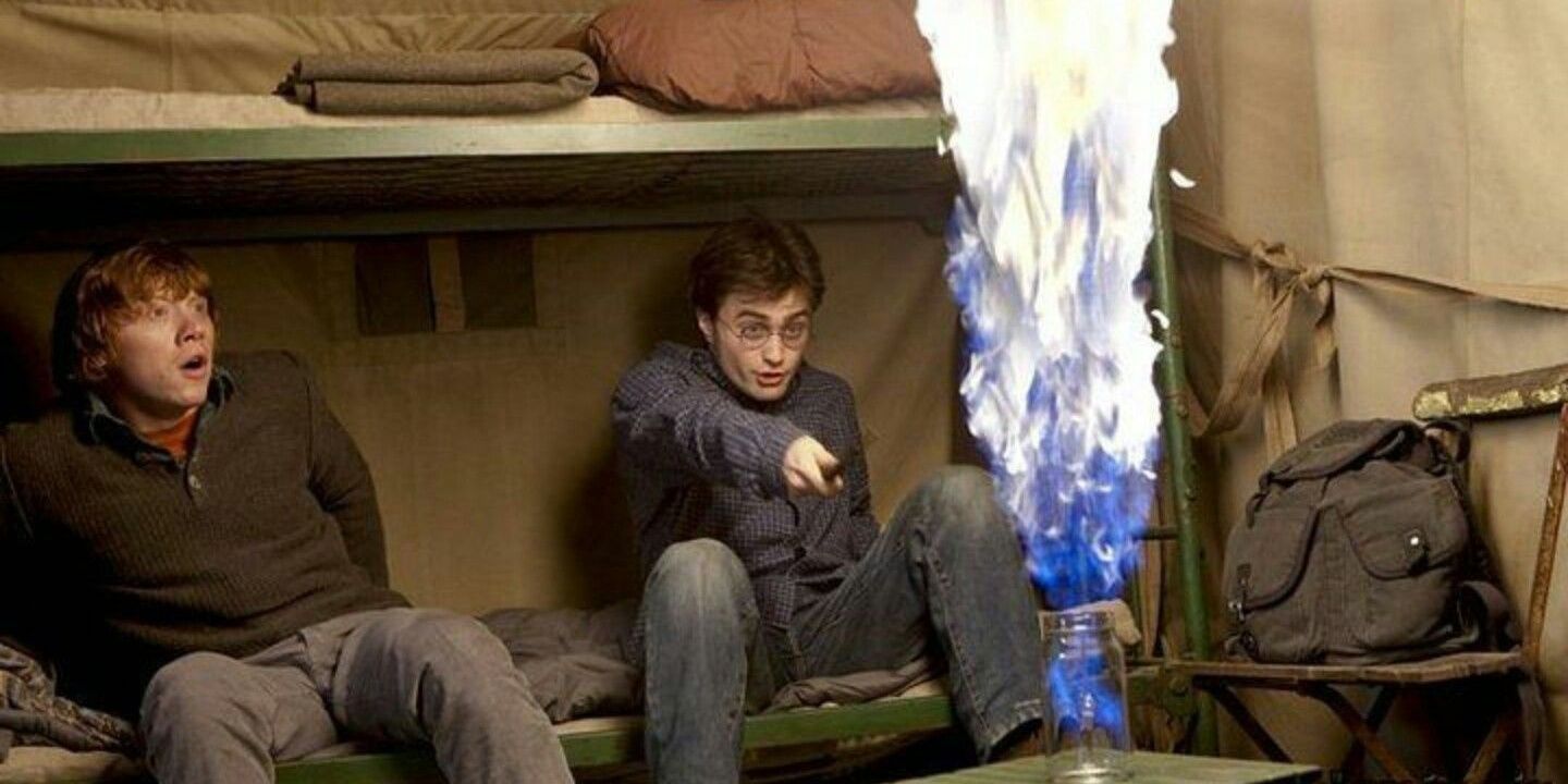 Harry and Ron frightened by the giant flame in their tent in Harry Potter and the Deathly Hallows