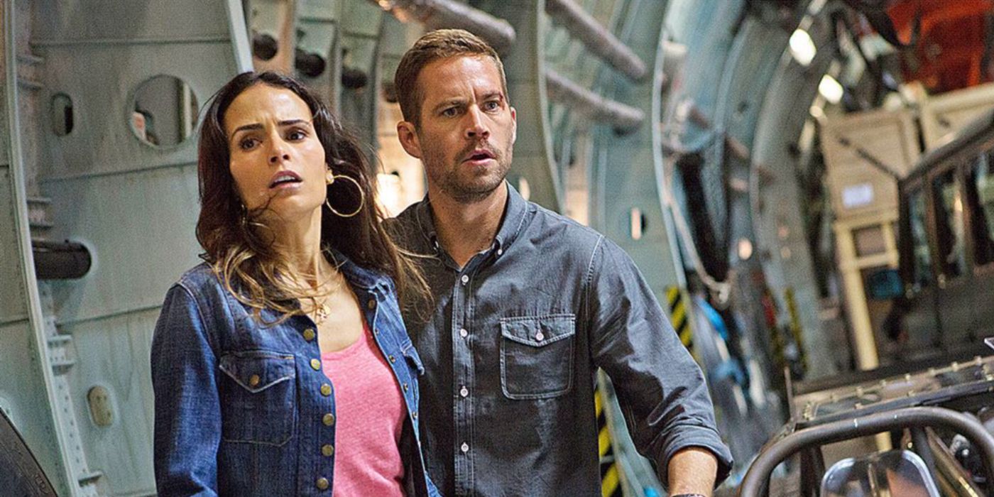 Mia and Brian try to get off the plane in Fast &amp; Furious 6