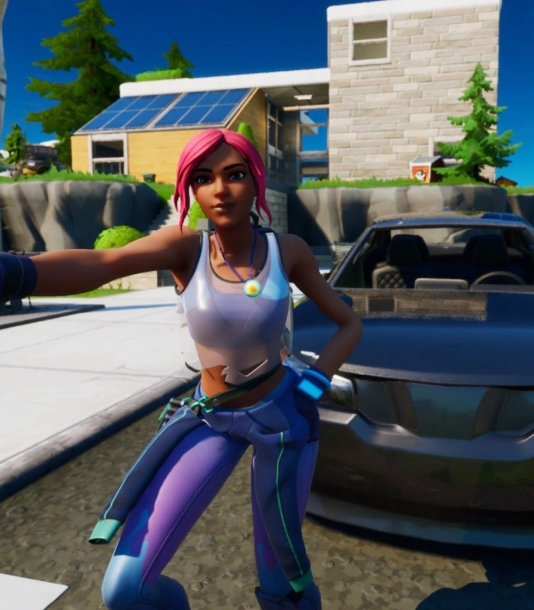 A player stands in front of a car in Fortnite Season 3