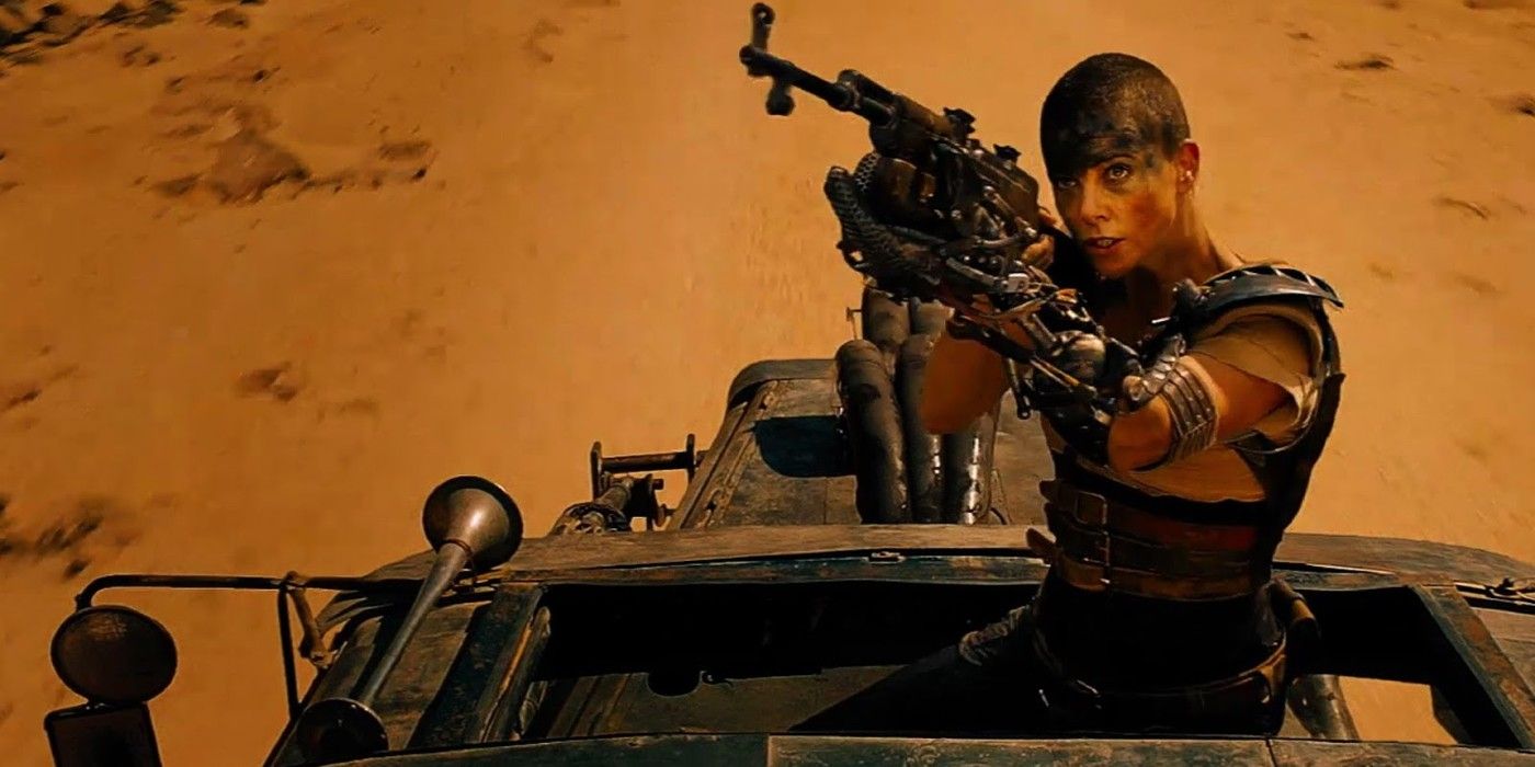 Furiosa aims a machine gun in Fury Road