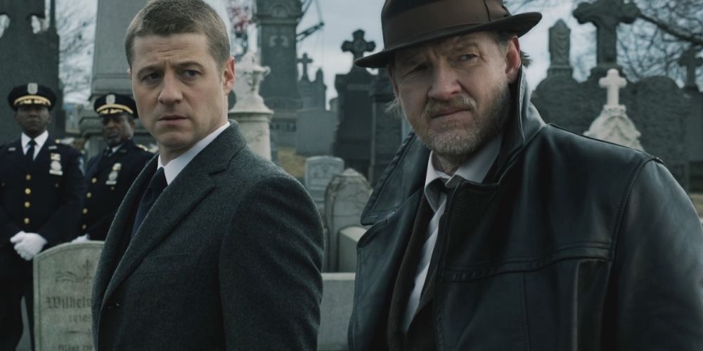 Jim Gordon and Harvey Bullock looking on in Gotham.
