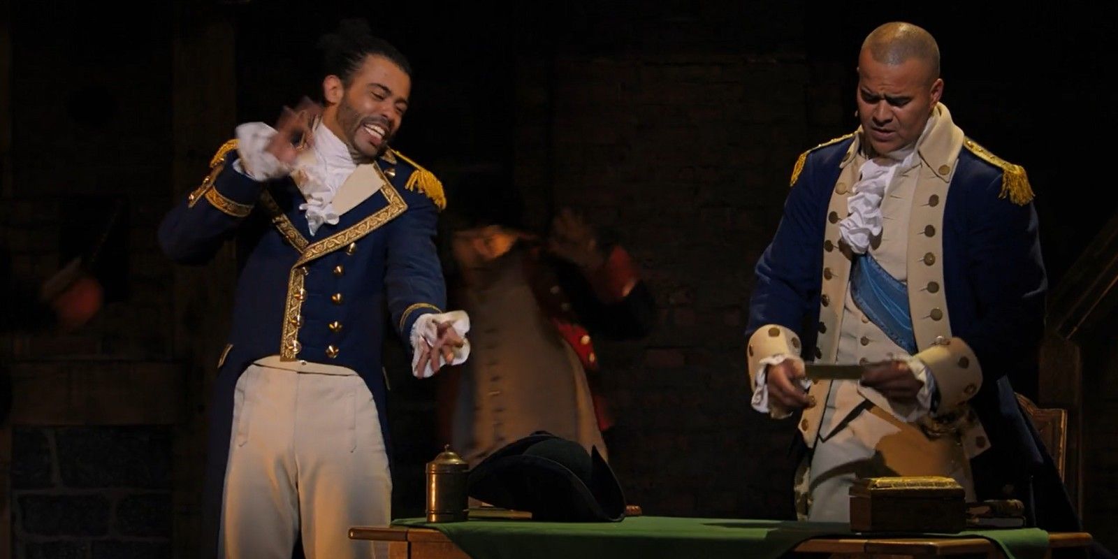 Daveed Diggs as Lafayette rapping to George Washington, played by Christopher Jackson in Hamilton