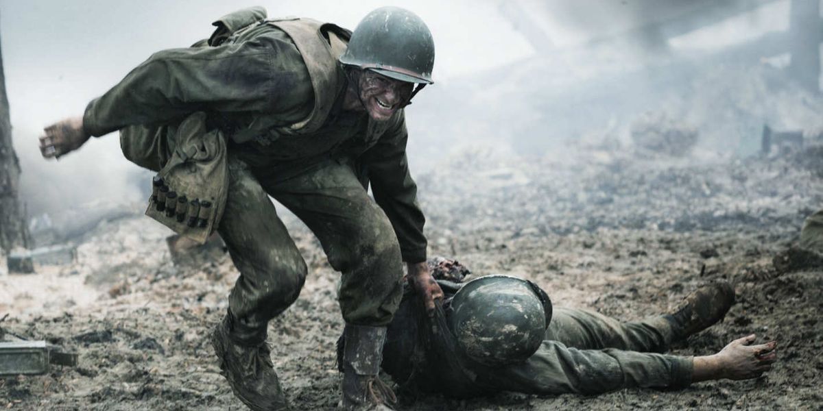 Desmond Doss carries a wounded soldier in Hacksaw Ridge