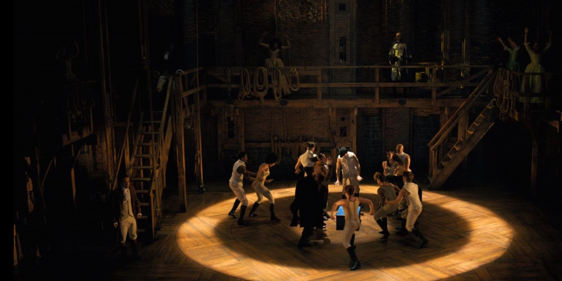 Dancing on wooden set of Hamilton.