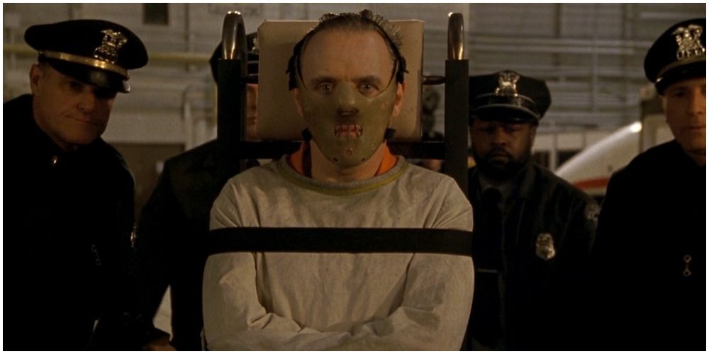 Anthony hopkins as Hannibal in a straitjacket and a muzzle mask in The silence of the lambs
