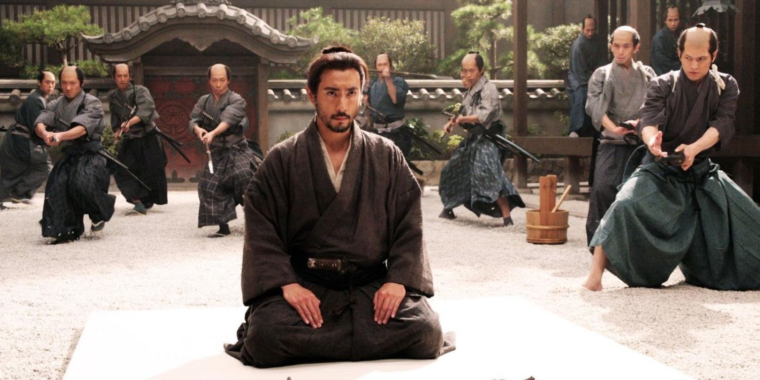 A warrior sits in Hara-Kiri Death of a Samuri