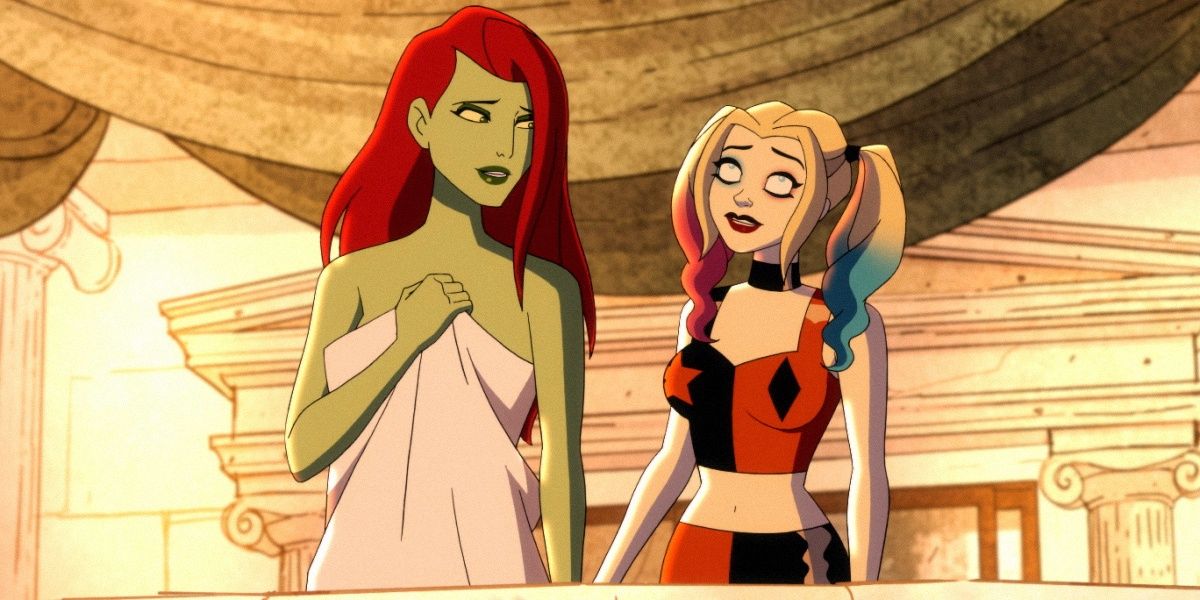 Poison ivy in a towel talks to Harley Quinn on a balcony