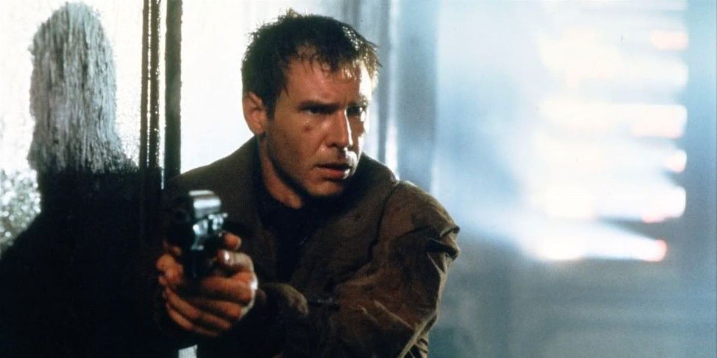 Rick Deckard pointing a gun and looking confused in Blade Runner