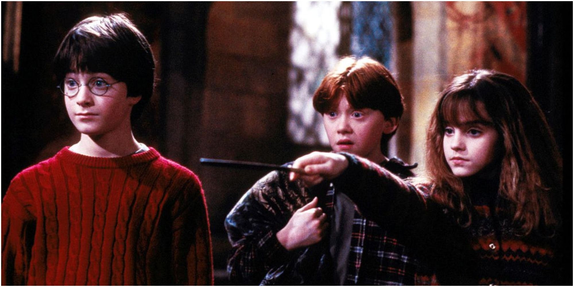 Hermione mostra seu feitiço destrancando portas secretas em Harry Potter e a Pedra Filosofal