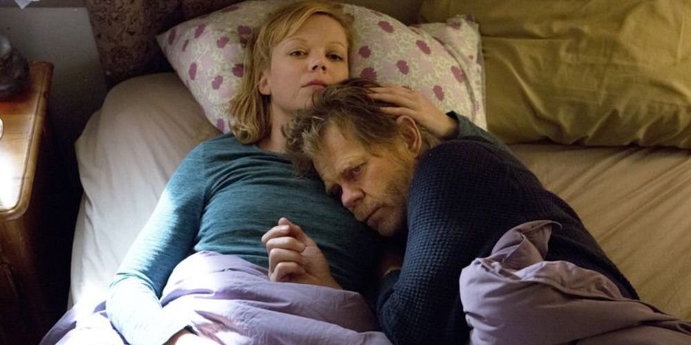 Frank is comforted by a woman in Shameless