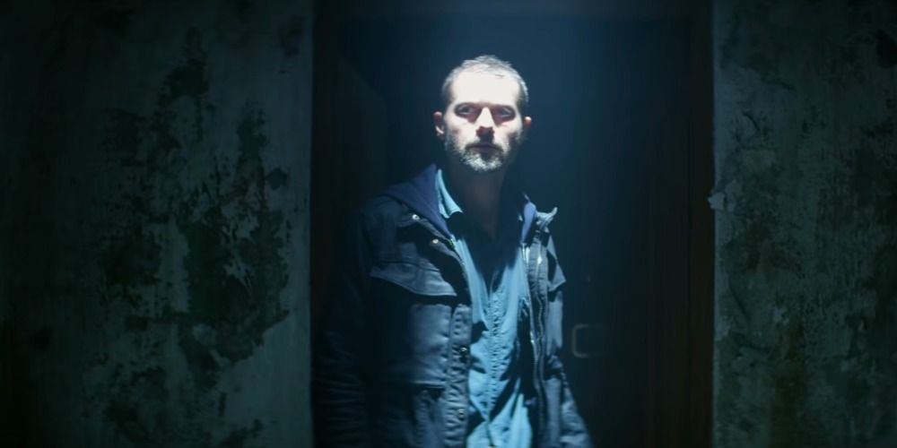James Badge Dale illuminated in a doorway in The Empty Man