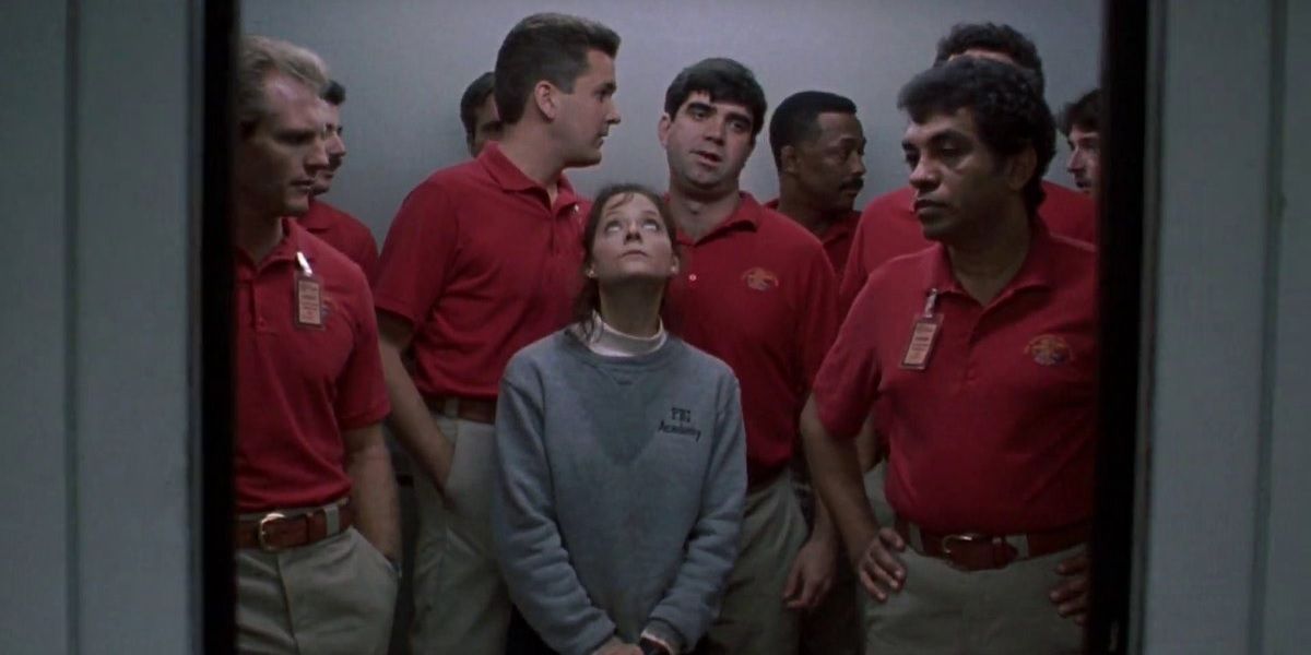 Jodie Foster in an elevator full of tall men in The Silence of the Lambs