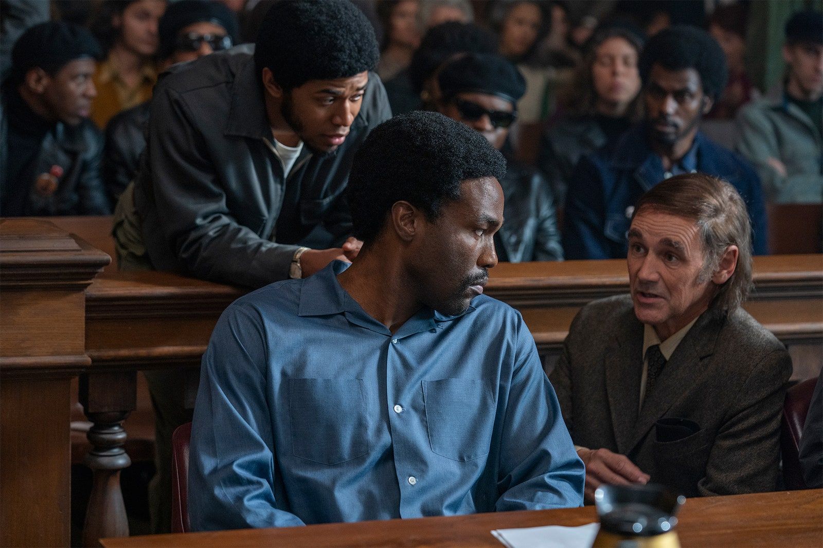 Kelvin Harrison Jr. as Fred Hampton, Yahya Abdul-Mateen II as Bobby Seale, Rylance as William Kuntsler in Trial of the Chicago 7