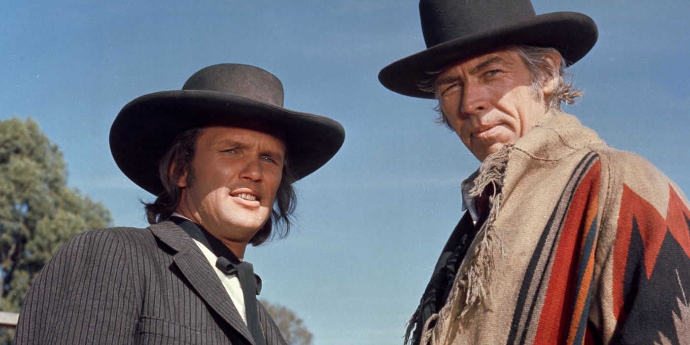 James Corburn and Kris Kristofferson looking off in the distance in Pat Garrett and Billy the Kid