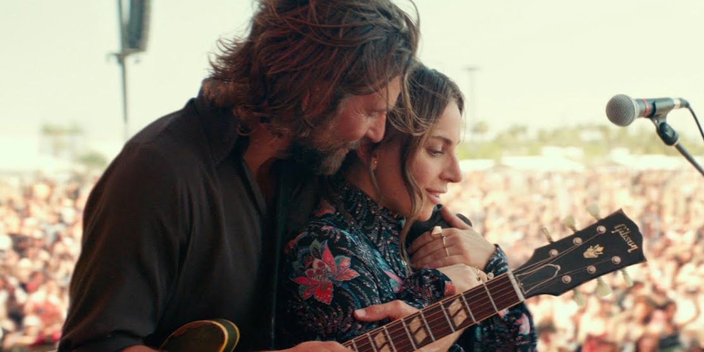 Bradley Cooper &amp; Lady Gaga play music on stag in A Star is Born.