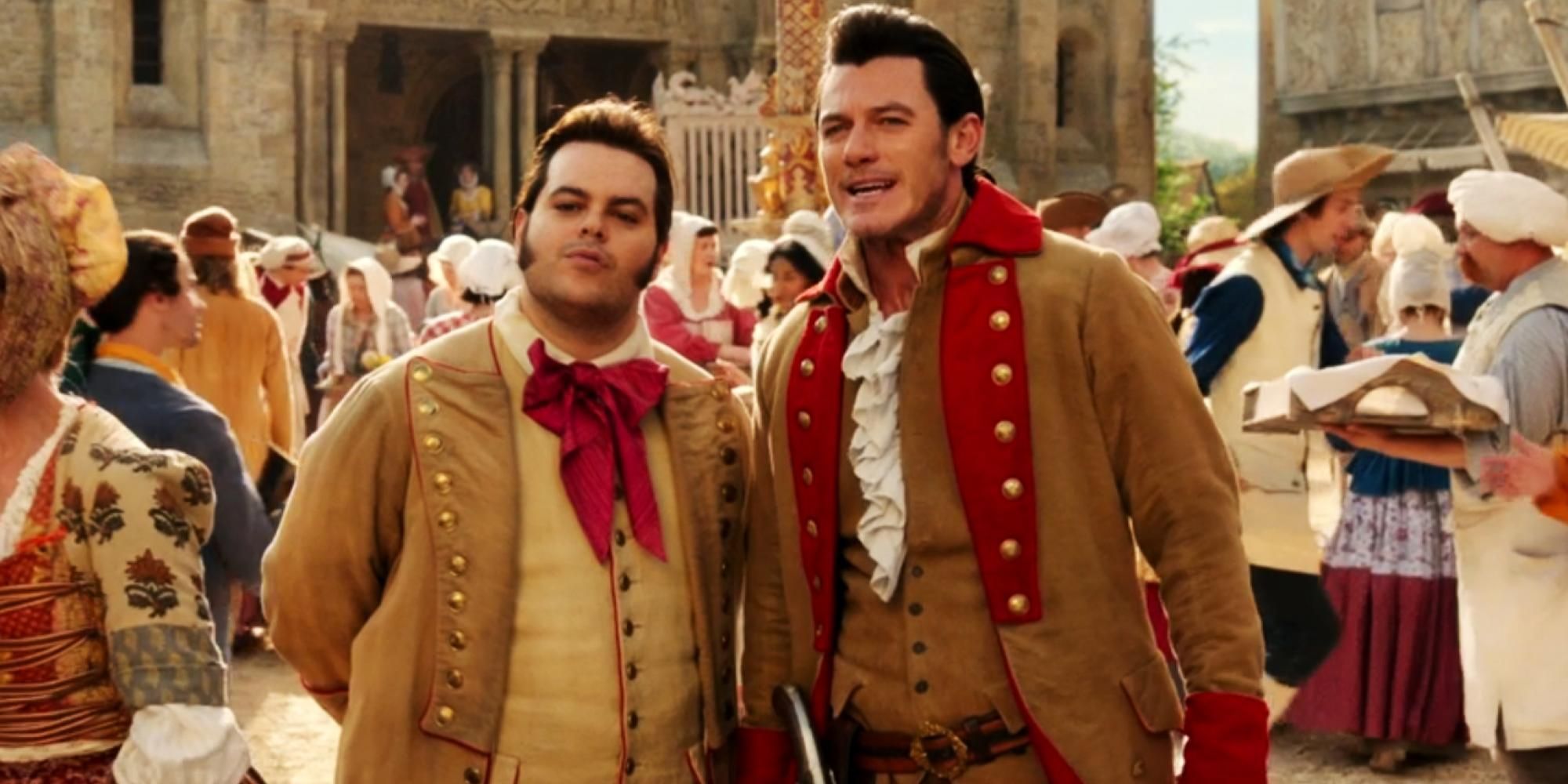 LeFou (Josh Gad) and Gaston (Luke Evans) in the town square in Beauty and the Beast