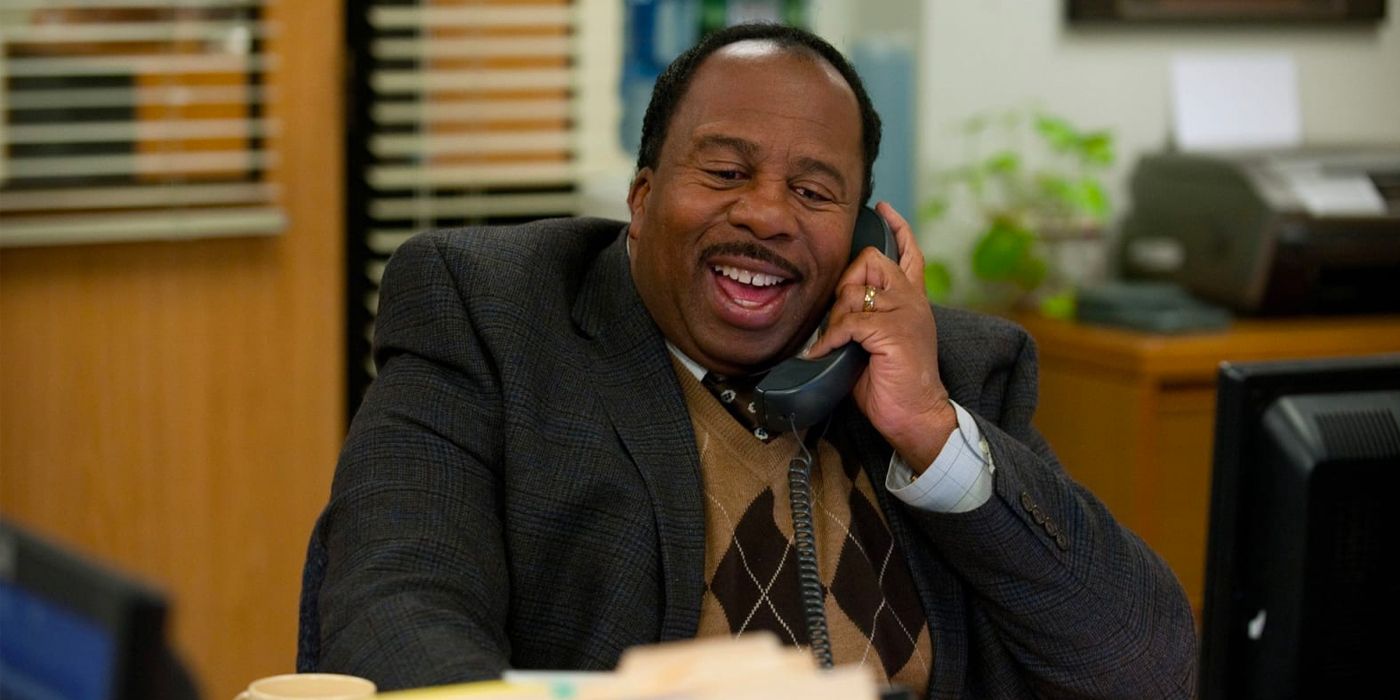 Stanley Hudson laughing on the phone in The Office