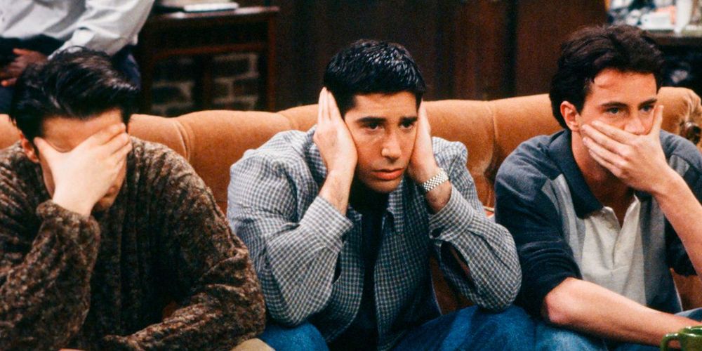 Friends-Ross, Joey, Chandler looking distressed at Central Perk