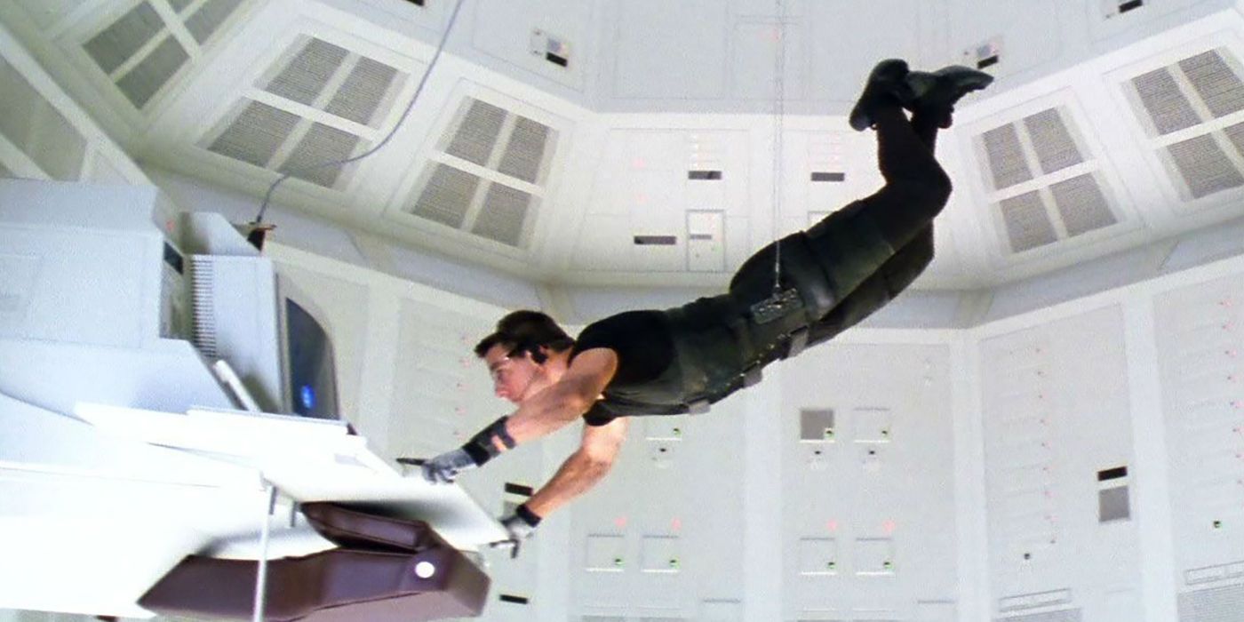 Ethan uses a harness to reach a computer in Mission: Impossible