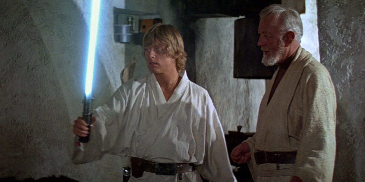 Obi-Wan gives Luke his father's lightsaber