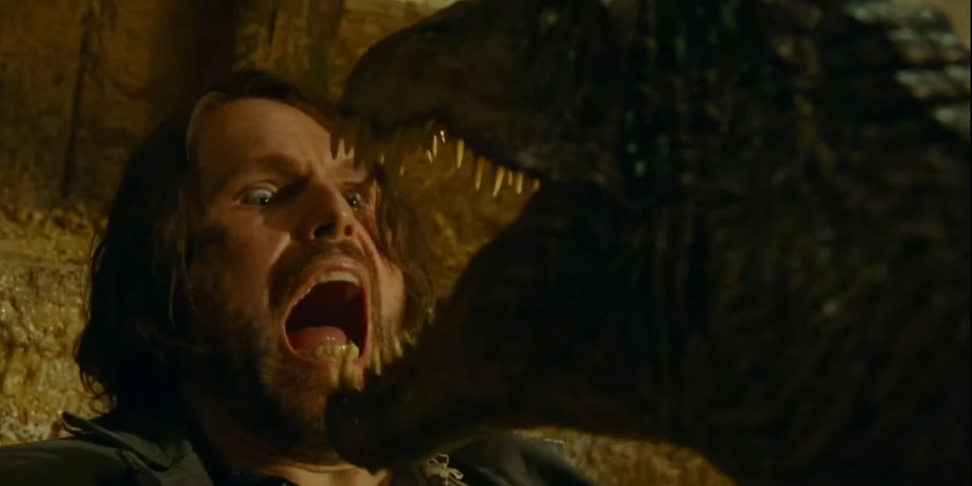 Rainn Delacourt being attacked by a baby Baryonyx in Jurassic World Dominion