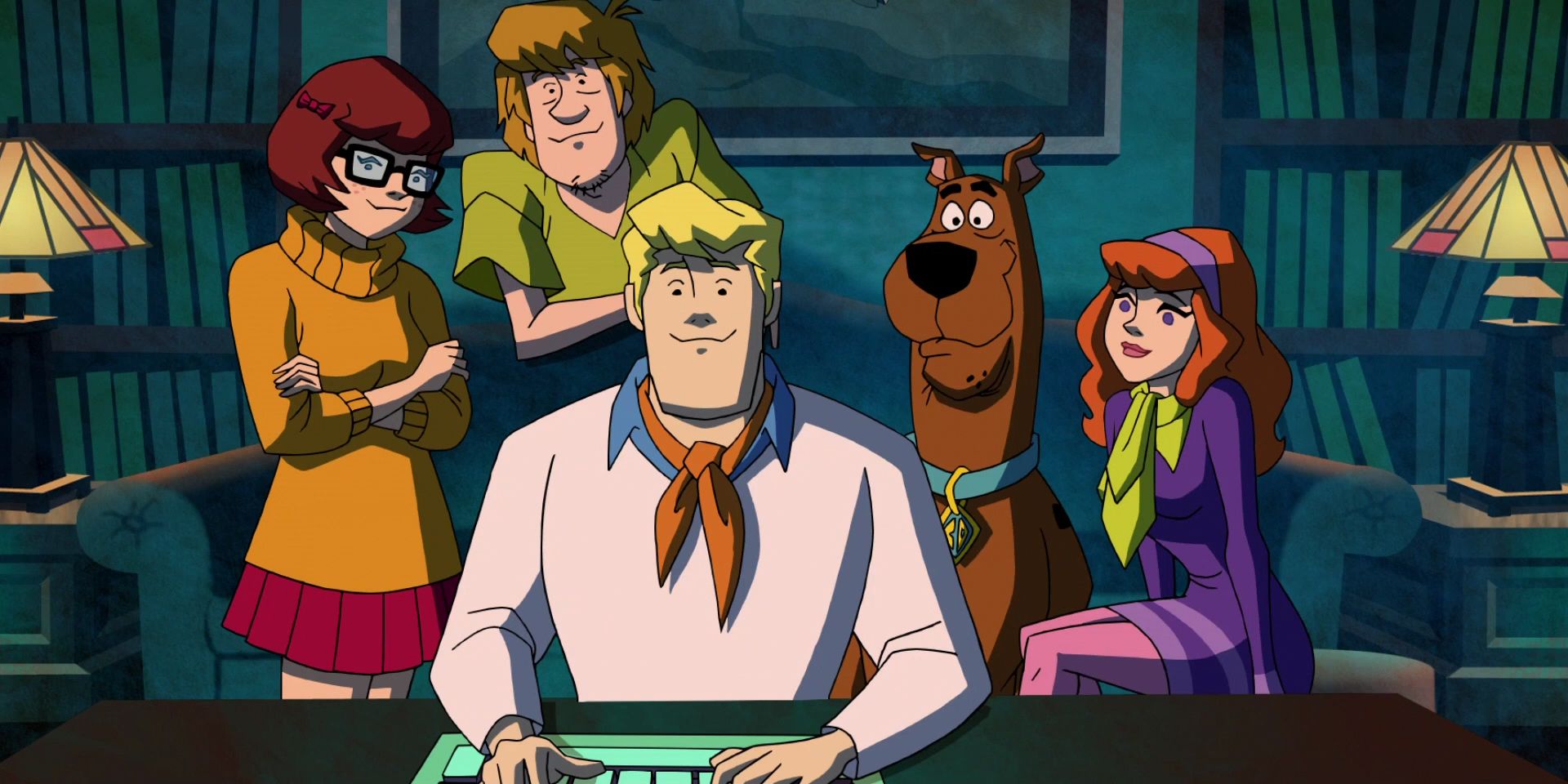 The Scooby-Doo characters sit in front of a keyboard