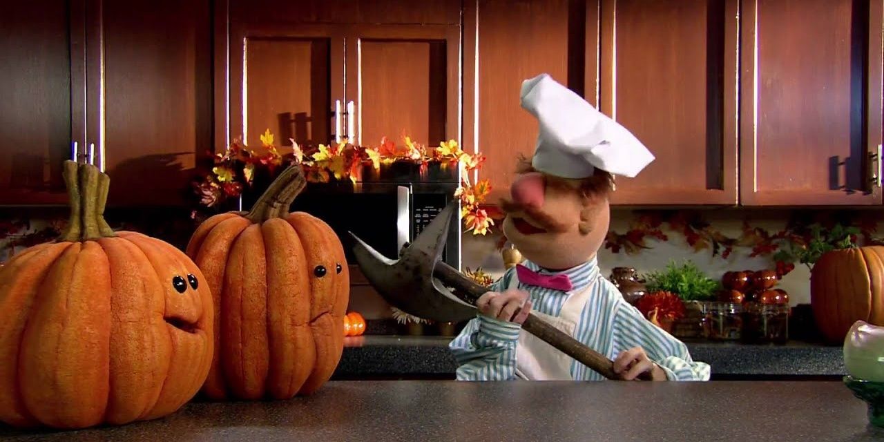 Swedish Chef holds an axe to some pumpkins