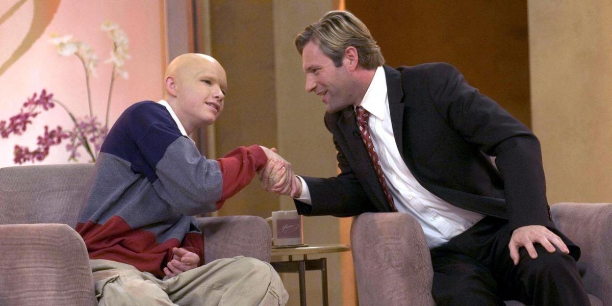 Nick shakes hands with a cancer patient on live TV in Thank You For Smoking.