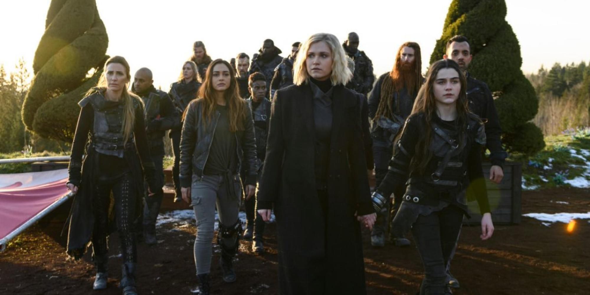 The 100 Cast walking at Sunset