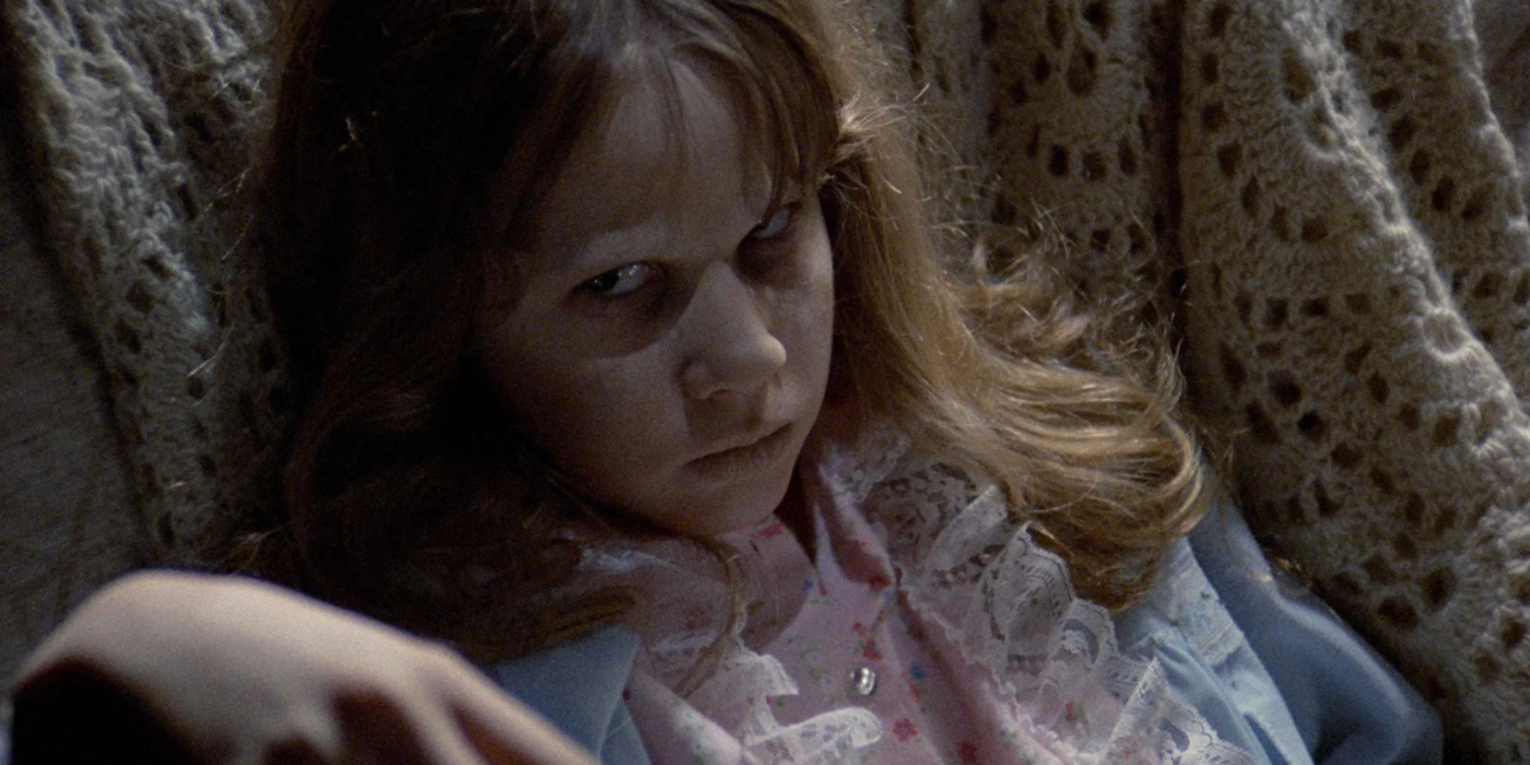Linda Blair, as Regan MacNeil, lies in bed in The Exorcist (1973)