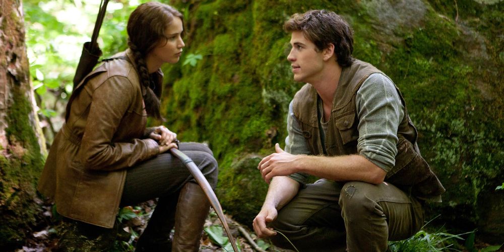 Katniss and Gale talking in The Hunger Games