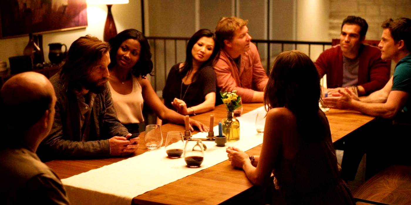 The characters sitting at the dinner party table in The Invitation