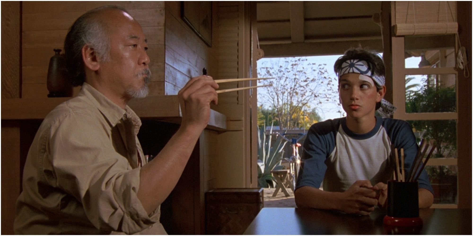 Mr. Miyagi and Daniel in The Karate Kid 1984