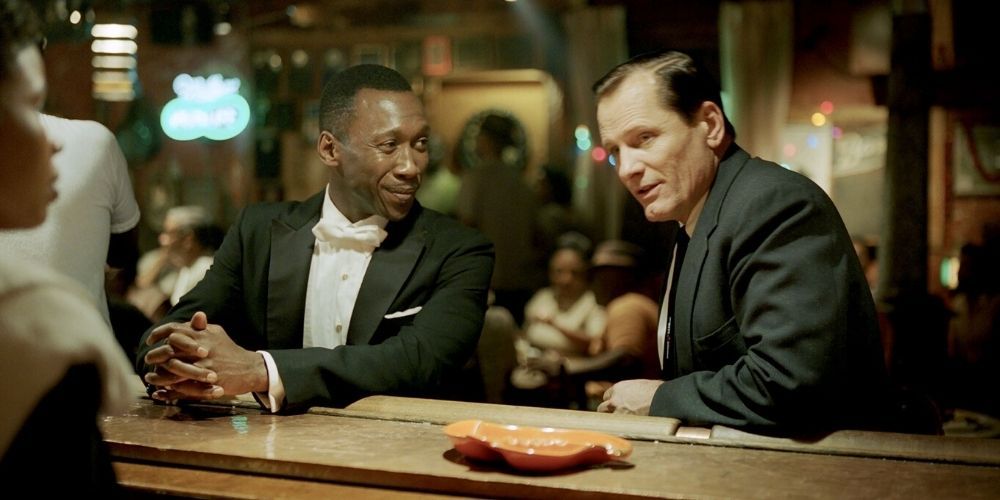 Tony and Don sit at a bar in Green Book