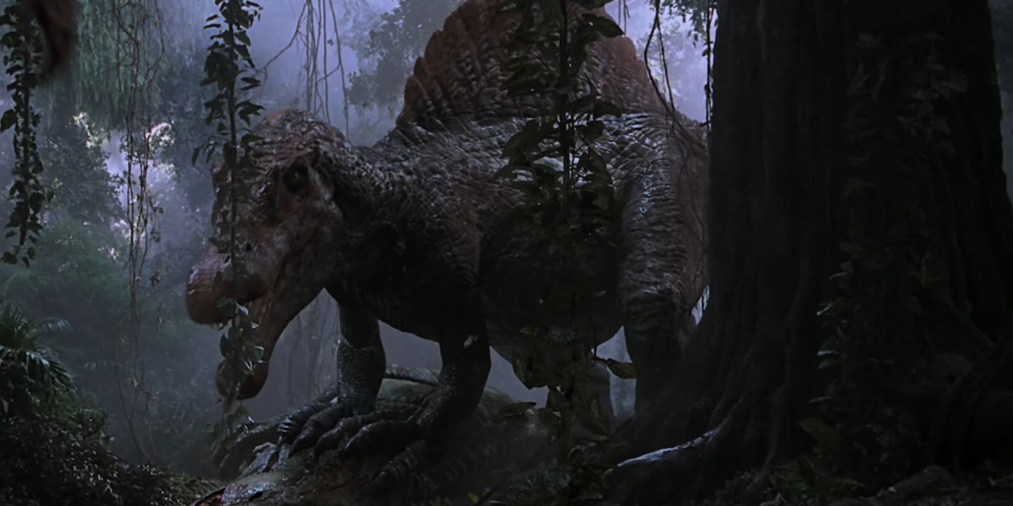 O Spinosaurus em pé sobre o cadáver do T-Rex em Jurassic Park III