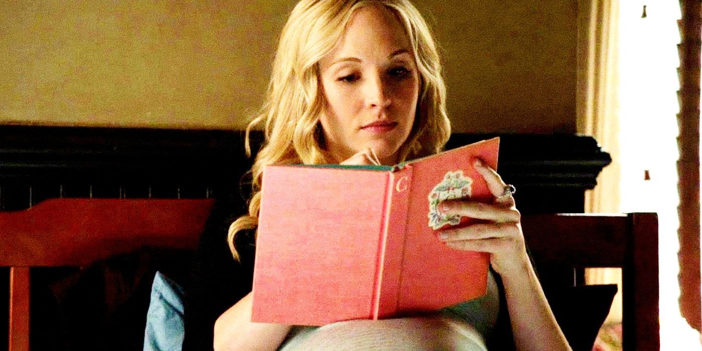 Caroline in bed reading a book in The Vampire Diaries