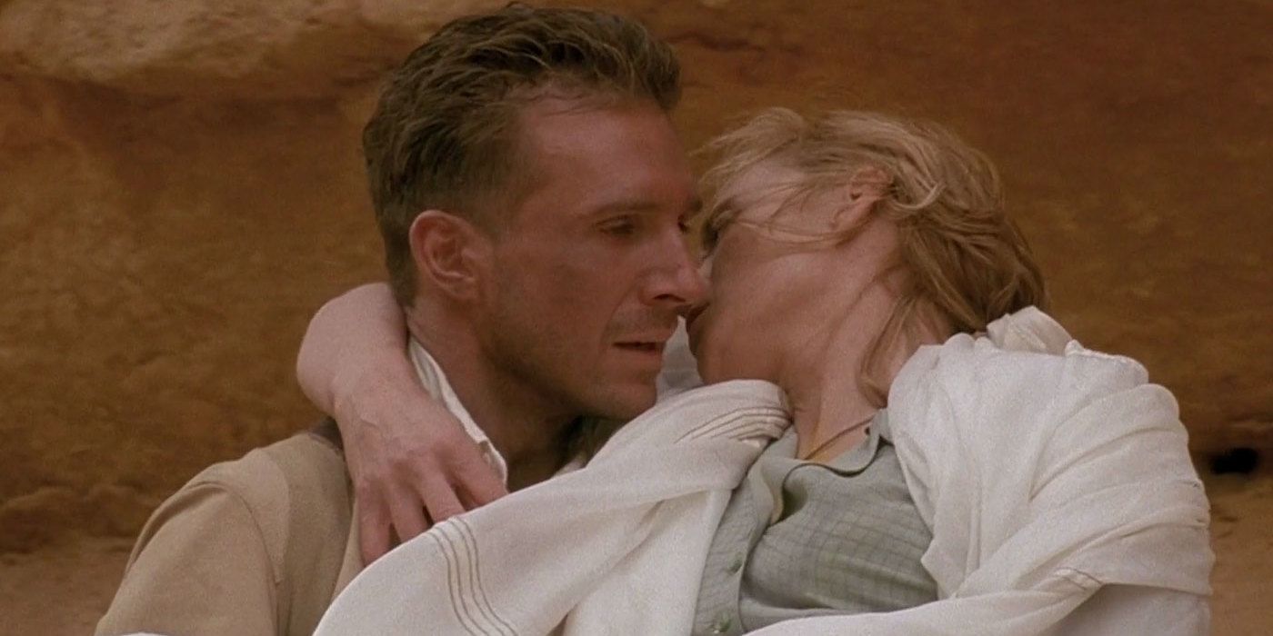 Ralph Fiennes carrying Juliette Binoche in The English Patient