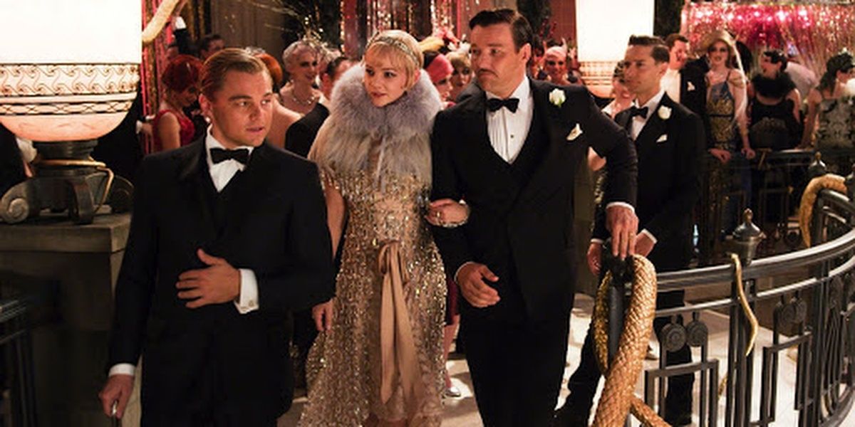 Gatsby, Daisy, and Tom at a party in The Great Gatsby